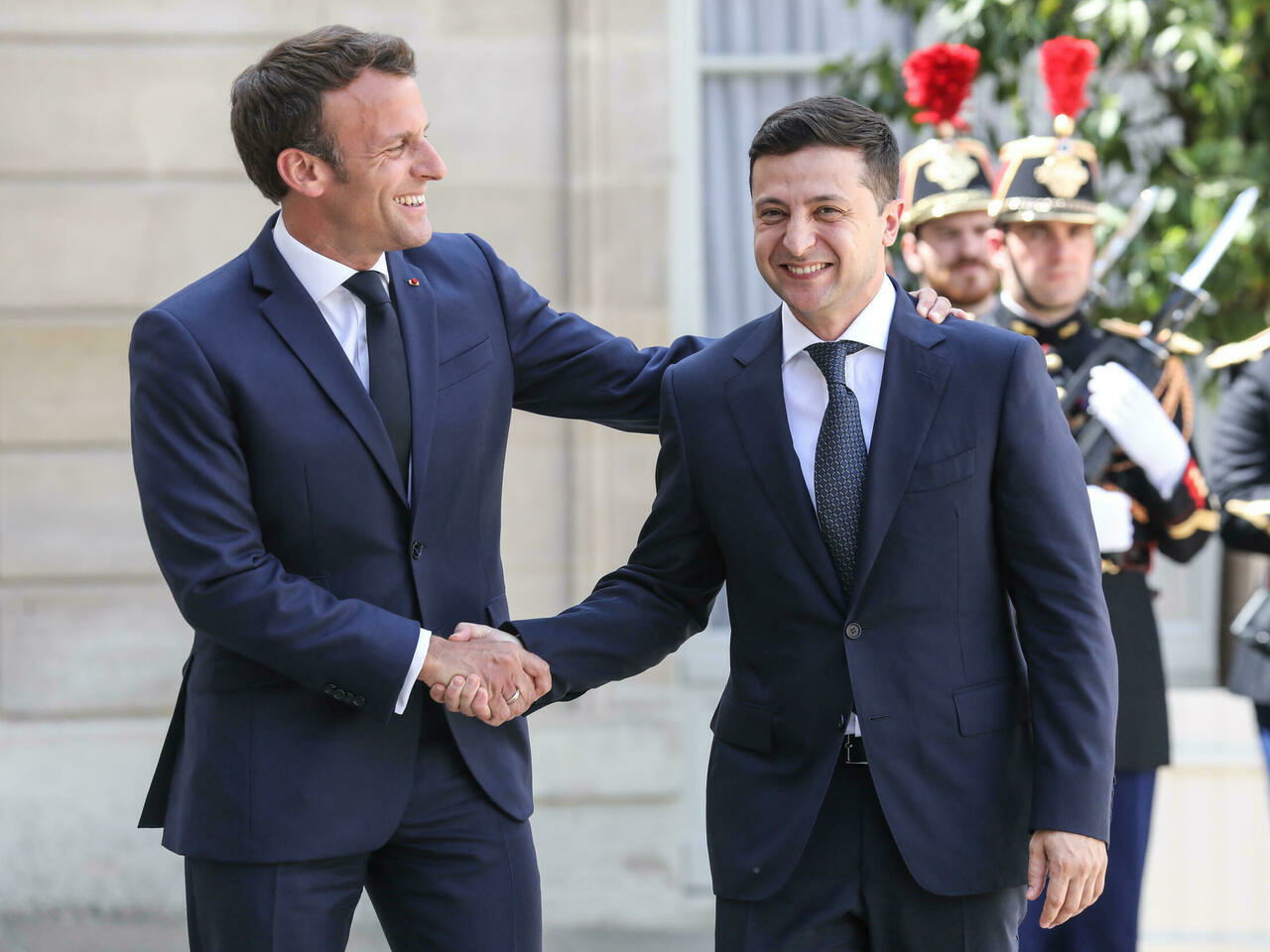 Macron arrives in Germany as diplomatic drive to solve Ukraine crisis continues